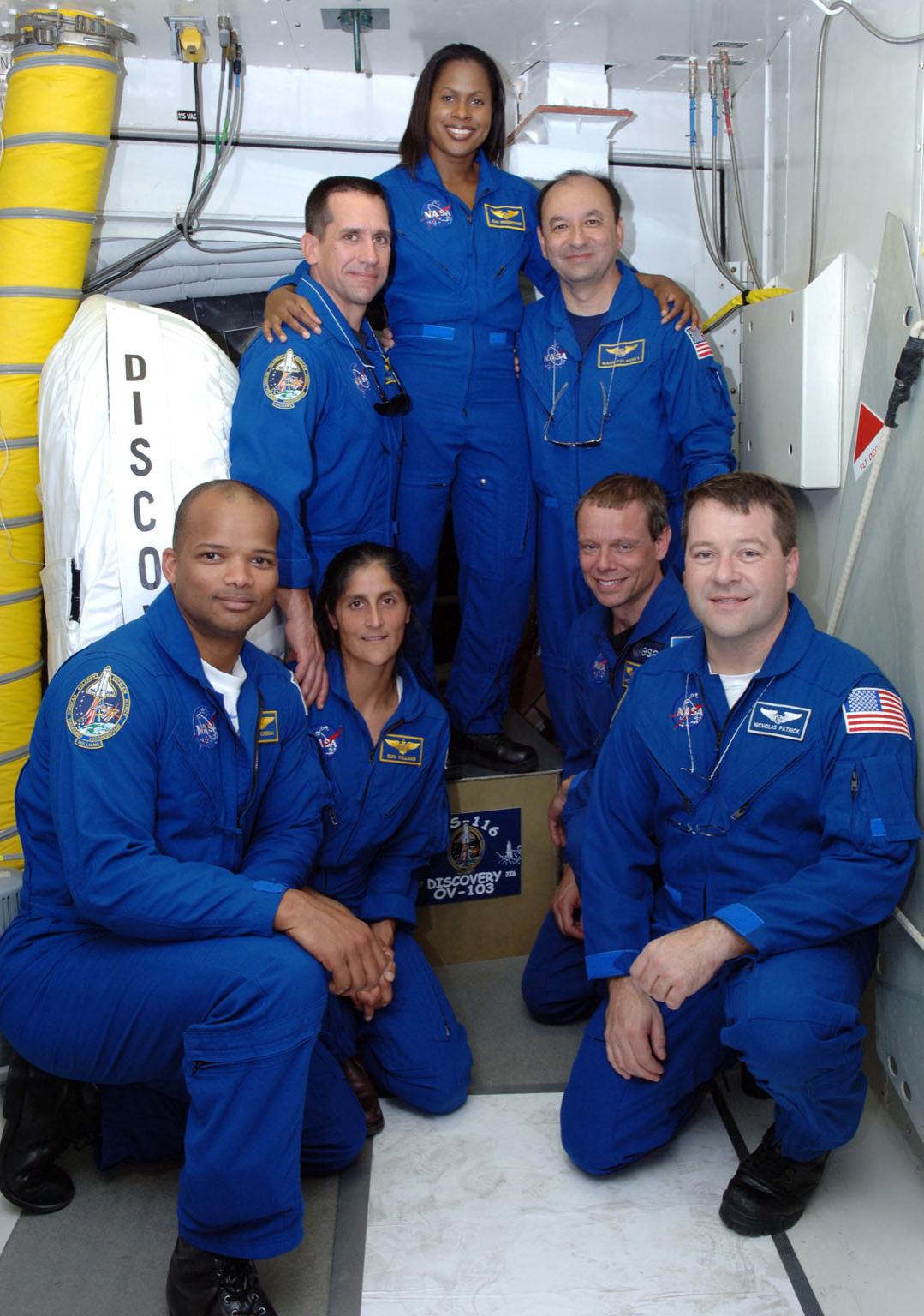 KENNEDY SPACE CENTER, FLA. -- The mission STS-116 crew poses in the ...